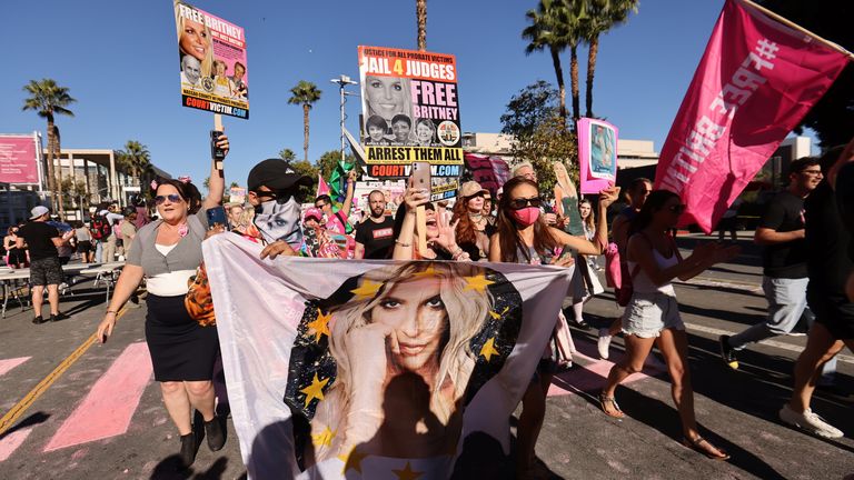 Supporters of singer Britney Spears gather outside the Stanley Mosk Courthouse on the day of her conservatorship case hearing, in Los Angeles, California, U.S. November 12, 2021. REUTERS/Mike Blake