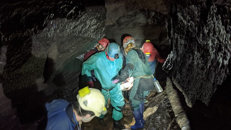 Rescue workers bringing the man out of the cave. Pic: South & Mid Wales Cave Rescue Team