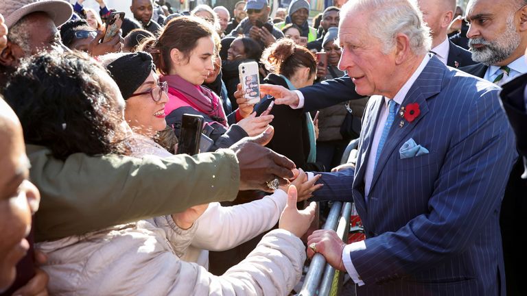 Britain&#39;s Prince Charles shakes hands with well-wishers as he departs after meeting The Prince&#39;s Trust Young Entrepreneurs at Brixton&#39;s NatWest Bank branch in London, Britain November 11, 2021. Chris Jackson/Pool via REUTERS
