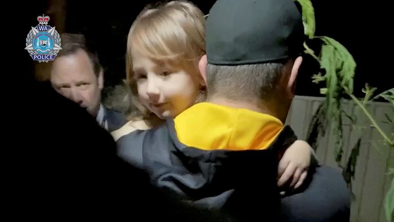 Bodycam footage shows a security officer carrying 4-year-old Cleo Smith, who went missing from an Australian outback campsite more than two weeks ago and was found in a locked house on November 3, as she is being rescued, in Carnarvon, Australia, November 3, 2021. Western Australia Police Force/Handout via REUTERS THIS IMAGE HAS BEEN SUPPLIED BY A THIRD PARTY. NO RESALES. NO ARCHIVES.  