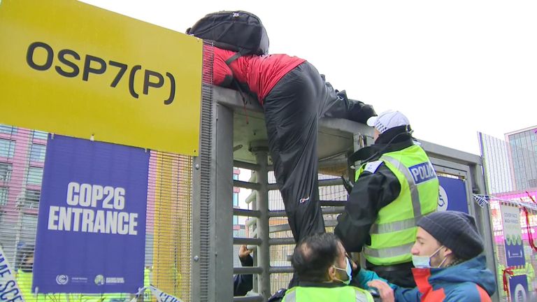 Climate protesters attempted to climb the perimeter fences around the the venue for the COP26 climate summit in Glasgow.