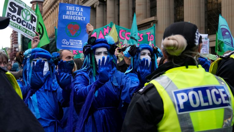 Extinction Rebellion activists take part in a demonstration against 'Greenwashing' (an attempt to make people believe that your company or government is doing more to protect the environment than it really is) near the COP26 U.N. Climate Summit in Glasgow, Scotland, Wednesday, Nov. 3, 2021. (AP Photo/Alastair Grant)
PIC:AP

