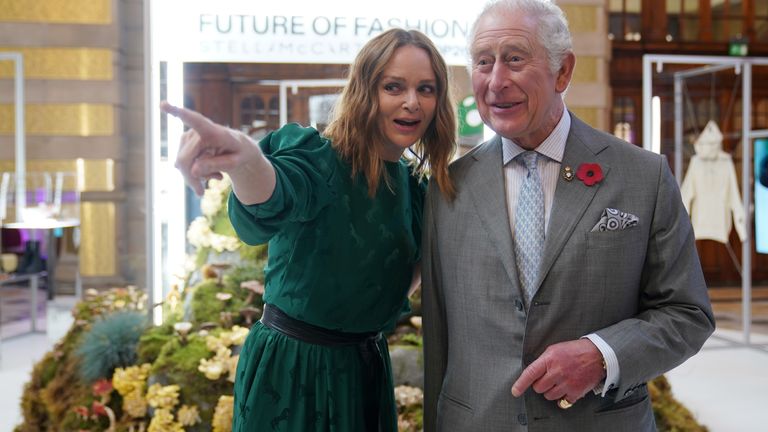 Britain&#39;s Prince Charles speaks with fashion designer and sustainability advocate Stella McCartney as he views a fashion installation by the designer, at the Kelvingrove Art Gallery and Museum, during the UN Climate Change Conference (COP26), in Glasgow, Scotland, Britain November 3, 2021. Owen Humphreys/Pool via REUTERS
