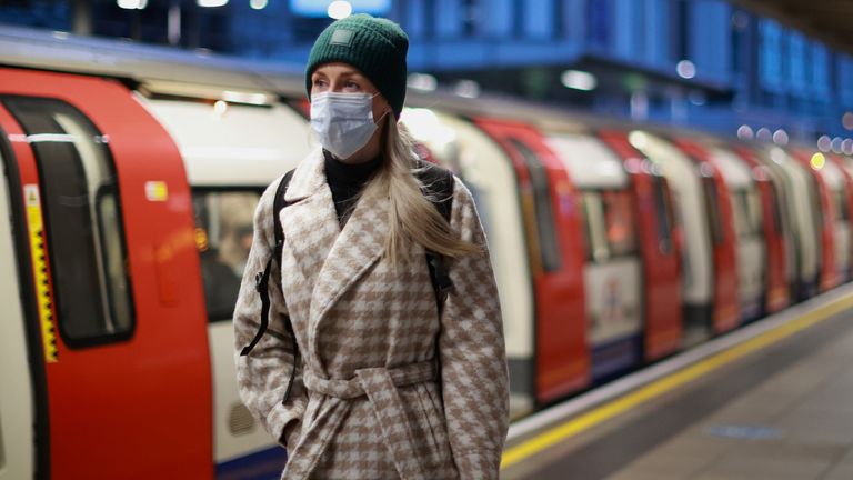 A person wears a face mask on the London underground, as the spread of the coronavirus disease (COVID-19) continues in London, Britain, November 30, 2021. REUTERS/Hannah McKay