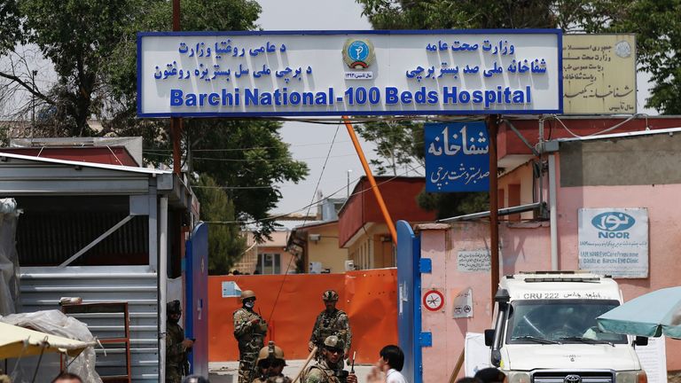 Afghan security forces stand guard outside Dasht-e-Barchi Hospital which came under attack in Kabul, Afghanistan May 12, 2020. REUTERS/Mohammad Ismail

