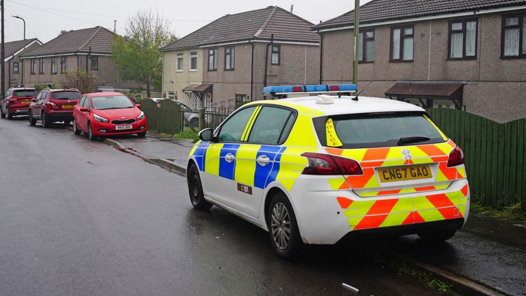 Police at the scene in Pentwyn, Penyrheol, near Caerphilly, where a 10-year-old boy has died following reports of a dog attack on Monday. The dog was destroyed by firearms officers and no other animals were involved in the attack. Picture date: Tuesday November 9, 2021.