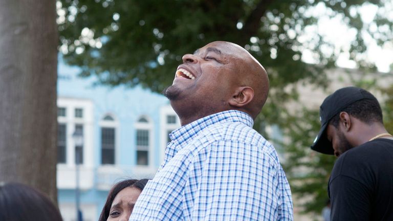 Dontae Sharpe breathes the air outside the Pitt County Courthouse after a judge determined he could be set free in 2019. Pic: AP