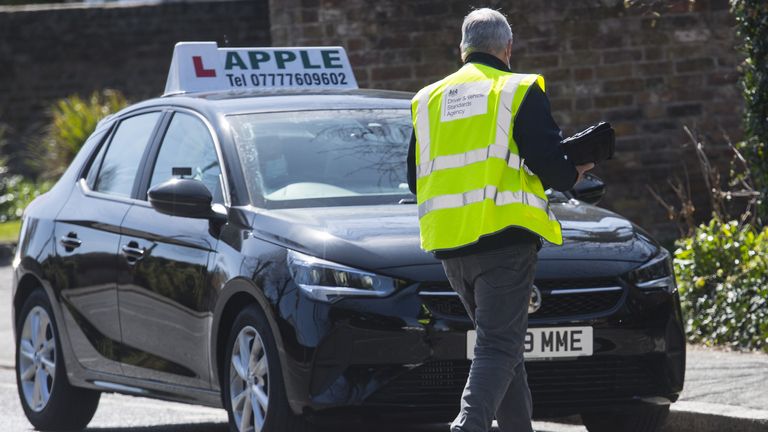 A driving instructor goes to begin a test at Brentwood, Essex, where examinations have resumed under the latest easing of lockdown restrictions. Driving tests have been suspended throughout the UK since early January but restart in England and Wales today. Picture date: Thursday April 22, 2021.