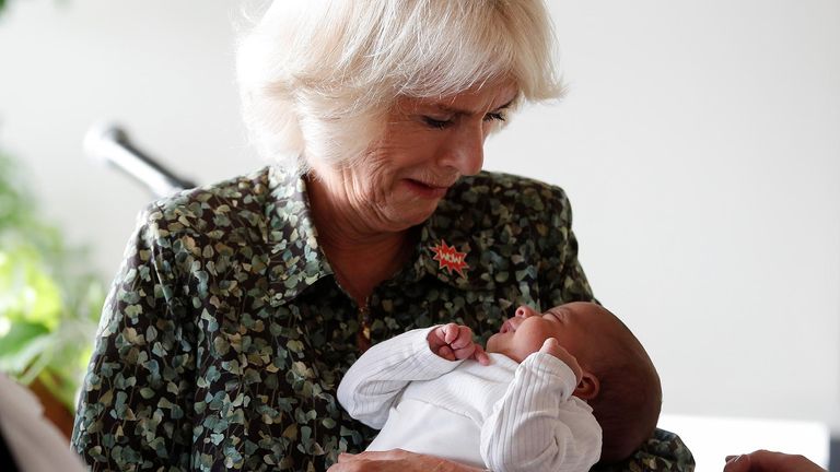The Duchess of Cornwall holds baby girl Sarah Abu Ameerah as she attends a Women of the World Foundation (WoW) event at the Manara Arts and Culture Cafe in Amman, Jordan, on the second day of the Royal tour of the Middle East. Picture date: Wednesday November 17, 2021.