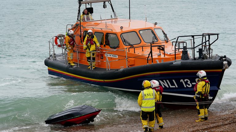 A jet ski thought to have been used in a migrant crossing is brought in to Dungeness, Kent, by the RNLI after being intercepted in the Channel. Picture date: Monday November 15, 2021.

