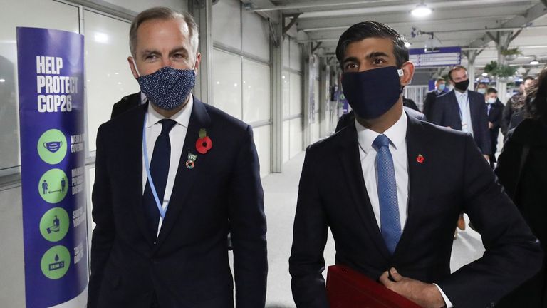 ormer Bank of England Governor Mark Carney and Britain&#39;s Chancellor of the Exchequer Rishi Sunak arrive at the UN Climate Change Conference (COP26) in Glasgow, Scotland, Britain, November 3, 2021. REUTERS/Yves Herman
