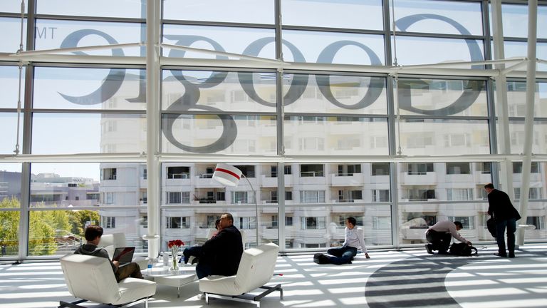 Attendees sits in front of a Google logo during Google I/O Conference at Moscone Center in San Francisco, California June 28, 2012. REUTERS/Stephen Lam (UNITED STATES - Tags: BUSINESS SCIENCE TECHNOLOGY)
