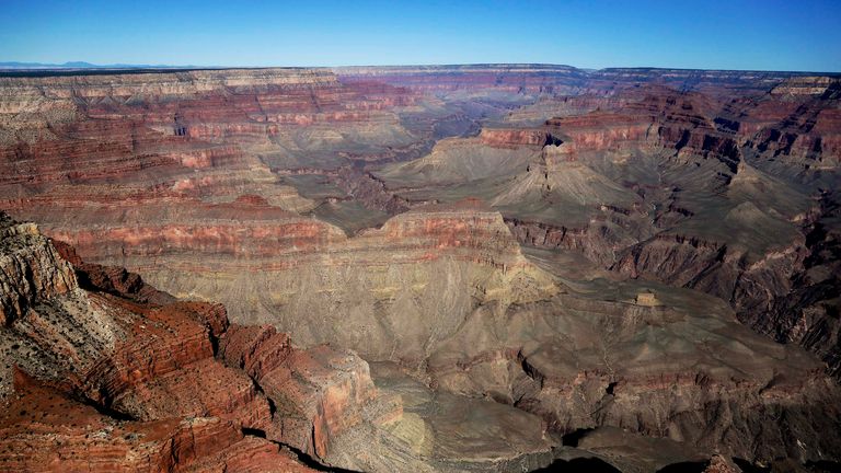 FILE - The Grand Canyon National Park is covered in the morning sunlight as seen from a helicopter near Tusayan, Ariz., on Oct. 5, 2013. The U.S. Senate has unanimously approved the nomination of Charles ...Chuck... Sams III as National Park Service director, which will make him the first Native American to lead the agency that oversees more than 131,000 square miles of parks and other landmarks. (AP Photo/Julie Jacobson, File)                                                            