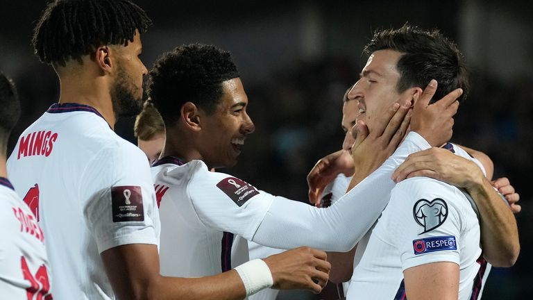 Harry Maguire (right) celebrated after scoring his side's opening goal. Pic: AP