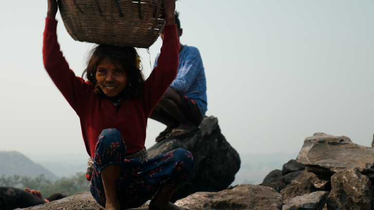 Please keep credit Nandemi, 10, at the coal mine in Jharia in Jharkhand, India. Pic: Dean Massey