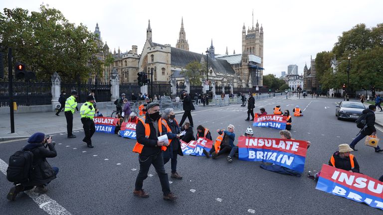 Protesters from Insulate Britain block the road in Parliament Square, central London. Picture date: Thursday November 4, 2021.
