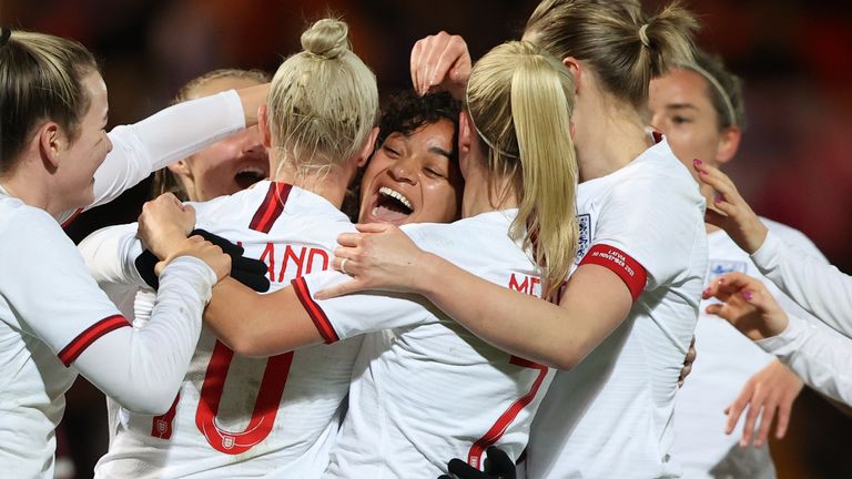 England&#39;s Jessica Carter celebrates scoring their eleventh goal with her teammates
