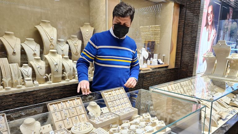 Jewellery shop owner Özgür says business is slower than during the pandemic
