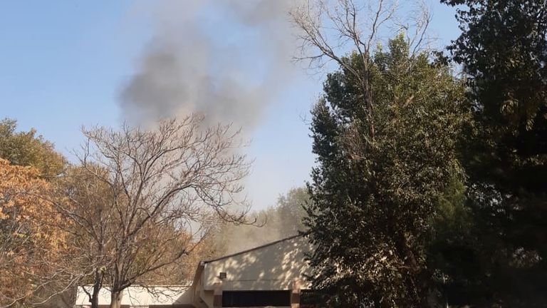 Smoke billows near the Sardar Mohammad Daud Khan National Military Hospital following an explosion