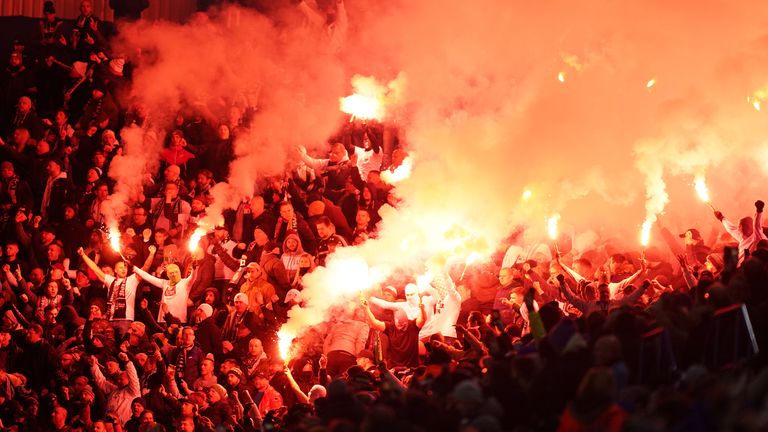 Legia Warsaw fans in the stands set off flares during the UEFA Europa League, Group C match