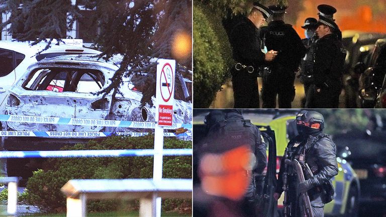 The burnt out shell following an explosion outside a hospital in Liverpool and police outside a property in Sefton  following the incident