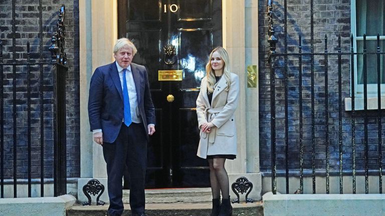 Lissie Harper, the widow of PC Andrew Harper, stands with Prime Minister Boris Johnson outside his official residence in London&#39;s Downing Street. Picture date: Wednesday November 24, 2021.