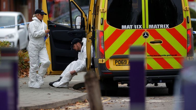 Forensic police officers work near the scene of a car blast outside Liverpool Women&#39;s Hospital, in Liverpool, Britain, November 15, 2021. REUTERS/Phil Noble
