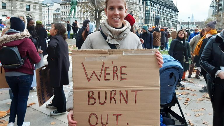 London-based midwife Sarah Muggleton, 27, takes part in a 'March with Midwives' in central London