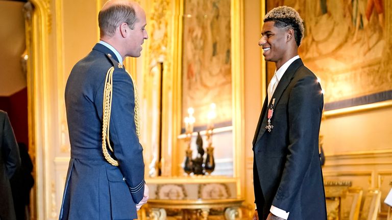 Footballer Marcus Rashford is made an MBE (Member of the Order of the British Empire) by the Duke of Cambridge during an investiture ceremony at Windsor Castle. Picture date: Tuesday November 9, 2021.
