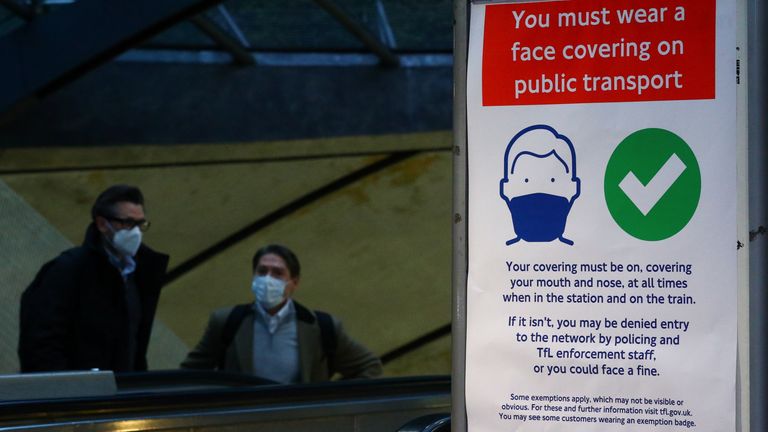 A sign is pictured at Canary Wharf underground station, as the spread of the coronavirus disease (COVID-19) continues in London, Britain, November 30