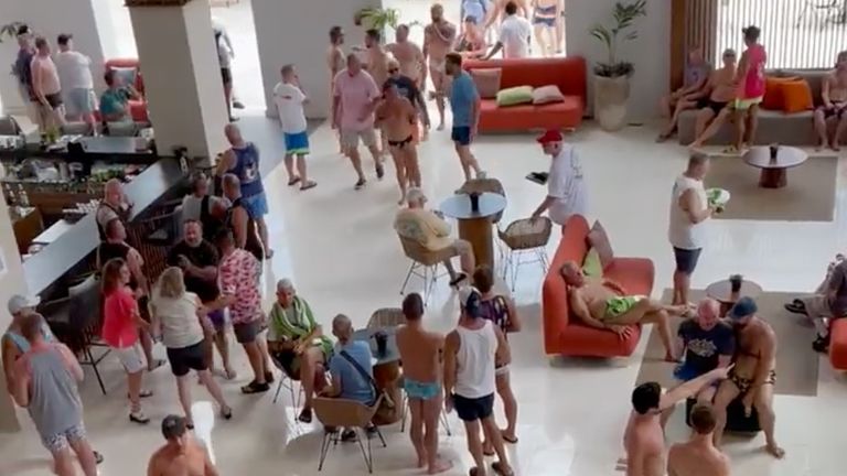 Guests gather in the hotel lobby of the Hyatt Ziva Riviera Cancun resort, in Cancun, after the shooting. Pic: Mike Sington via Reuters