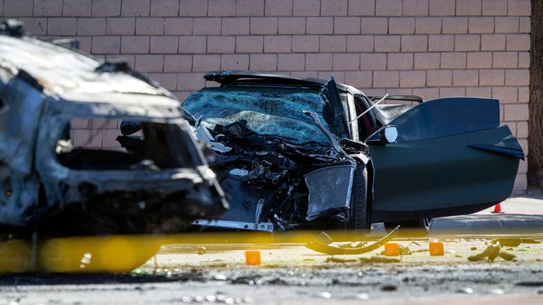 A Chevrolet Corvette is shown at the scene of a fatal crash on South Rainbow Boulevard between Tropicana Avenue and Flamingo Road in Las Vegas, Tuesday, Nov. 02, 2021. Las Vegas Raiders wide receiver Henry Ruggs III is facing a driving under the influence charge after a fiery vehicle crash early Tuesday in Las Vegas that left a woman dead and Ruggs and his female passenger injured, authorities said