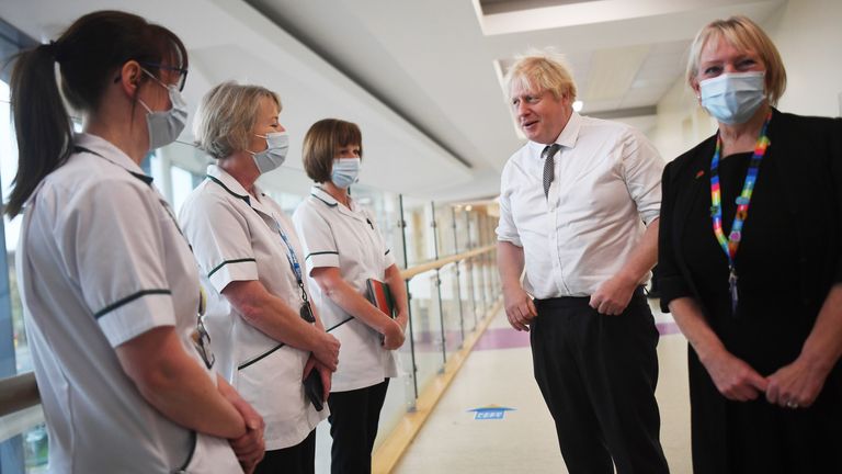 Prime Minister Boris Johnson meets with medical staff during a visit to Hexham General Hospital in Northumberland. Picture date: Monday November 8, 2021.