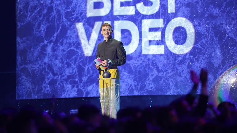 Olly Alexander of Brit band Years and Years presents the Best Video award 