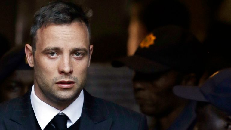 FILE -- In this Wednesday, June 15, 2016 file photo Oscar Pistorius leaves the High Court in Pretoria, South Africa, after his sentencing proceedings. The Pistorius case is back in court, Friday, Nov. 3, 2017, with prosecutors seeking a longer jail sentence for the double-amputee athlete after he was found guilty of murder for shooting his girlfriend, Reeva Steenkamp. (AP Photo/Themba Hadebe, File)