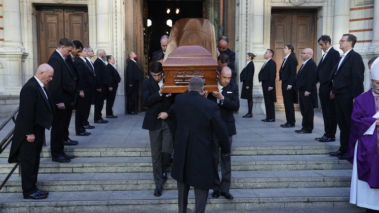 Pall bearers carry the coffin of Sir David Amess, from Westminster Cathedral, in central London, following his requiem mass. Picture date: Tuesday November 23, 2021.