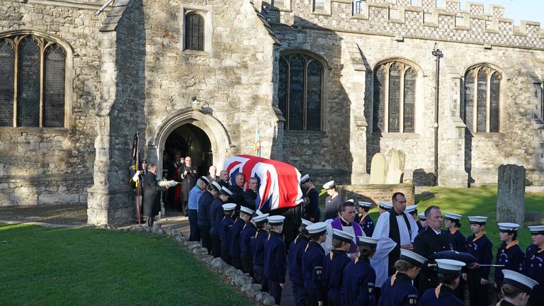 Pall bearers from Southend Fire Service carry the coffin of Sir David Amess out of St Mary&#39;s Church in Prittlewell, Southend, following his funeral service. Picture date: Monday November 22, 2021.
