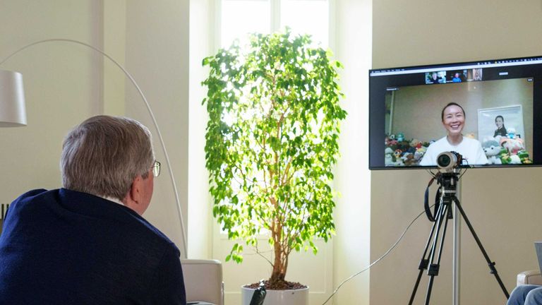 Peng Shuai talking to IOC President Thomas Bach