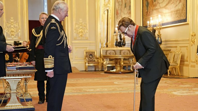 Sir Elton John is made a member of the Order of the Companions of Honour by the Prince of Wales during an investiture ceremony at Windsor Castle. Picture date: Wednesday November 10, 2021.
