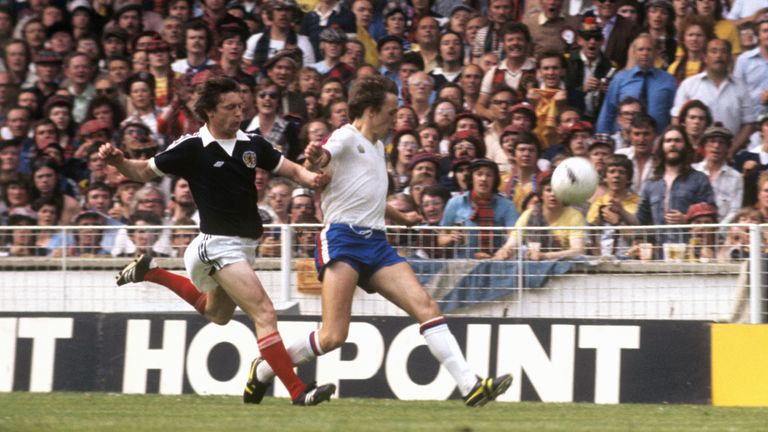 Scotland captain Bruce Rioch and Kennedy tussle for the ball during the 1977 Wembley clash