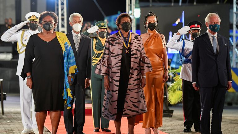 Barbados&#39; Prime Minister Mia Mottley, new President Sandra Mason, singer Rihanna, former cricketer Garfield Sobers and Britain&#39;s Prince Charles stand during the Presidential Inauguration Ceremony to mark the birth of a new republic in Barbados, Bridgetown, Barbados, November 30, 2021. REUTERS/Toby Melville/Pool 