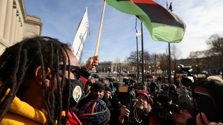 People react to the verdict in the trial of Kyle Rittenhouse, outside the Kenosha County Courthouse in Kenosha, Wisconsin, U.S., November 19, 2021. REUTERS/Evelyn Hockstein