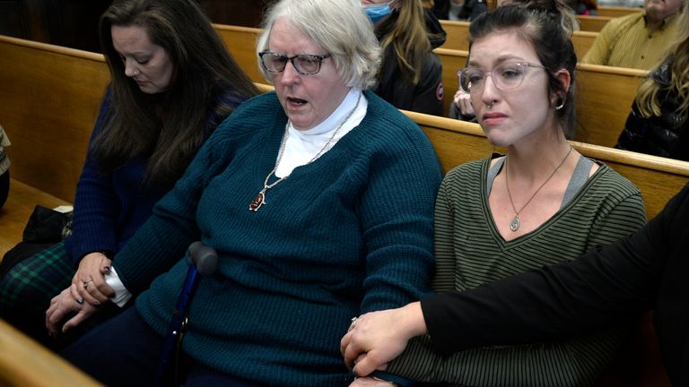 Kariann Swart, Joseph Rosenbaum&#39;s fiancee, Susan Hughes, Anthony Huber&#39;s great aunt, and Hannah Gittings, Anthony Huber&#39;s girlfriend, listen as Kyle Rittenhouse is found not guilty on all counts at the Kenosha County Courthouse in Kenosha, Wis., on Friday, Nov. 19, 2021. Pic: AP