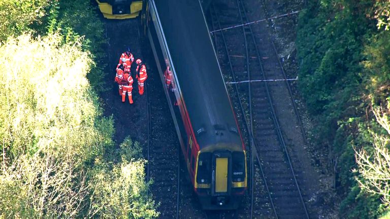  scene of a crash involving two trains near the Fisherton Tunnel between Andover and Salisbury in Wiltshire. Fifty firefighters were called to the scene of the collision on Sunday