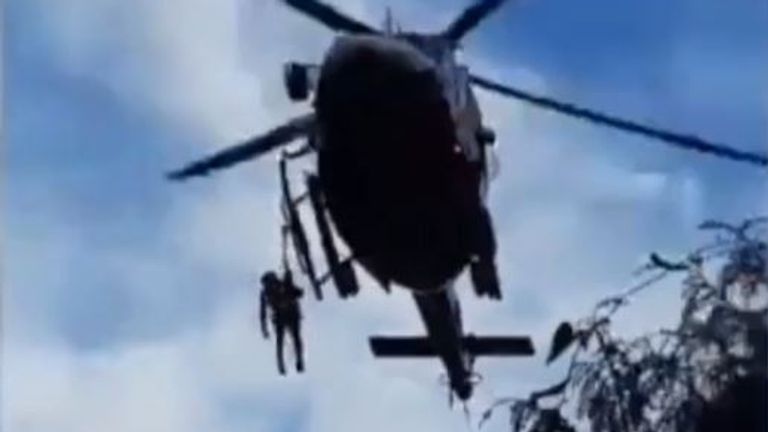 Helicopter airlifts people cut off by floods in Sardinia