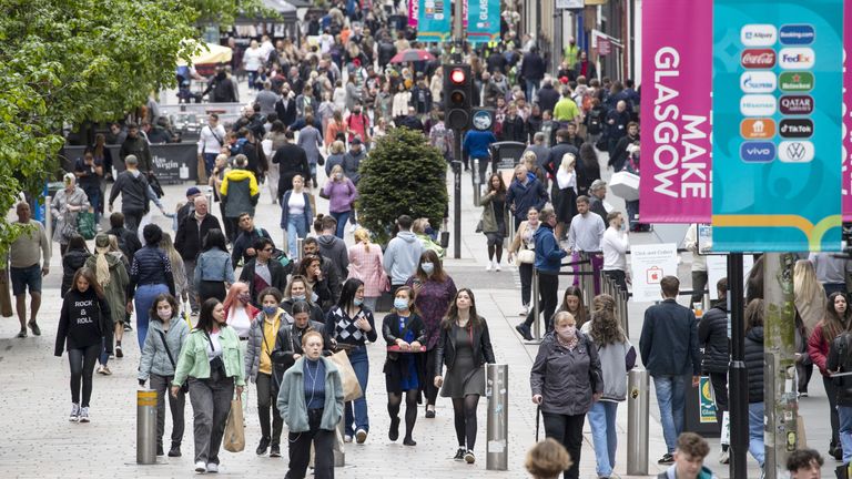File photo dated 28/05/21 of shoppers in Glasgow city centre. Consumer confidence crept up in November as shoppers put aside concerns about soaring inflation to spend in the run-up to Black Friday and Christmas, figures show.
