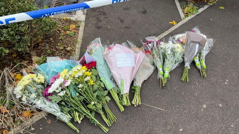 flowers at the scene of the suspected murder in Dragon Rise in Norton Fitzwarren. Two men, aged 34 and 67, have been arrested on suspicion of murder and are currently in custody for questioning