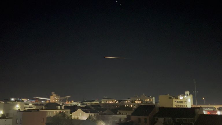 SpaceX Crew-2 streaks across the sky as it makes its return to Earth, in New Orleans, Louisianna, U.S., November 8, 2021, in this still image taken from a social media video. @_tehgreat/via REUTERS THIS IMAGE HAS BEEN SUPPLIED BY A THIRD PARTY. MANDATORY CREDIT. NO RESALES. NO ARCHIVES.
