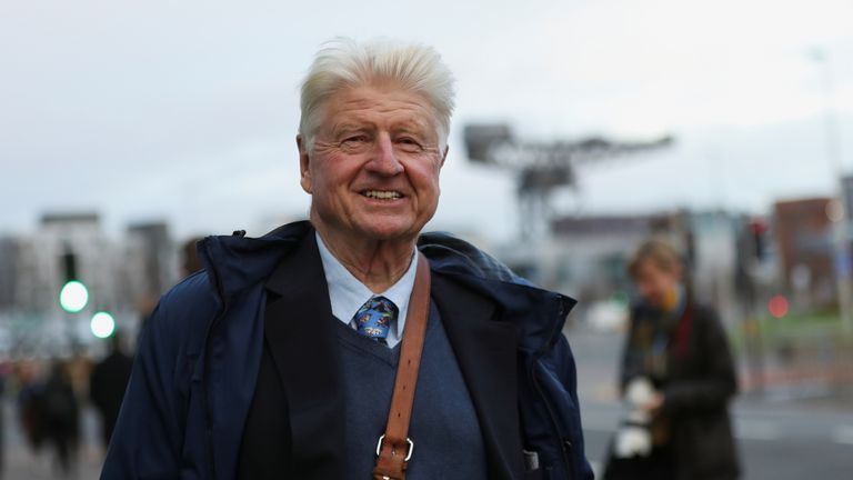 Stanley Johnson, father of Britain's Prime Minister Boris Johnson, reacts as he walks during the UN Climate Change Conference (COP26) in Glasgow, Scotland, Britain, November 9, 2021. REUTERS/Russell Cheyne
