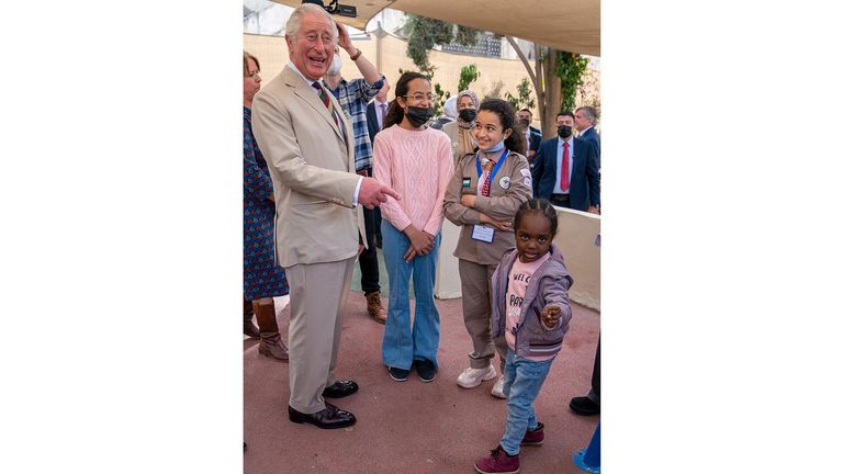 The Prince of Wales four year old Salapelo during a visit to the Al Nuzha Community Centre in Jordan, on the second day of the Royal tour of the Middle East. Picture date: Wednesday November 17, 2021.